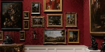 assorted picture frames on wall