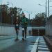 group of people running on street