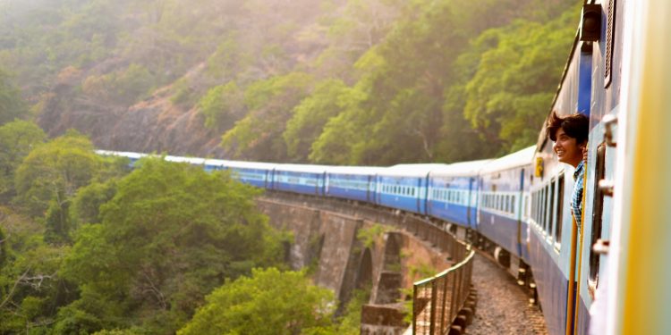 moving train near trees