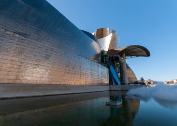 a building that is next to a body of water