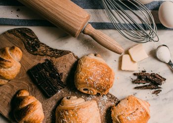 brown wooden rolling pin beside brown wooden rolling pin
