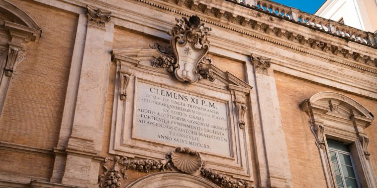 a large building with a clock on the front of it