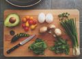 avocado, tomatoes, eggs, mushrooms, spring onions, and leaves