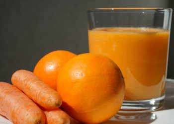 orange fruit on clear glass bowl