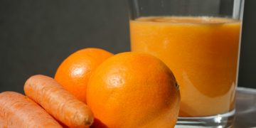 orange fruit on clear glass bowl