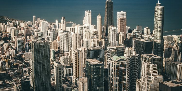 aerial view photography of city buildings near body of water