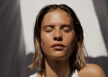 woman in white tank top