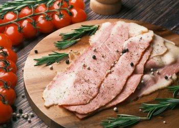raw meat on brown wooden chopping board